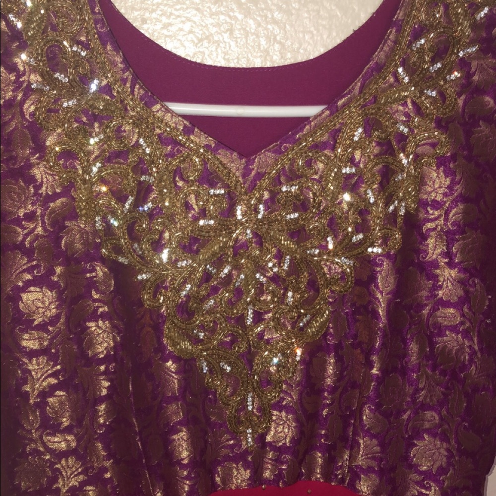 purple nd pink long dress it has purple tights